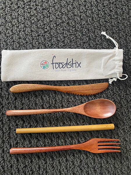 Eco friendly wood cutlery with bamboo straw and travel pouch